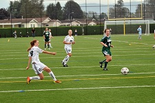 Girls playing football